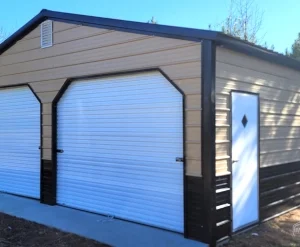 A metal storage shed with two white roll-up doors and a side entry door.