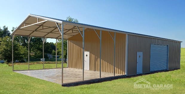 A wooden shed with an attached metal frame canopy on a grassy lawn.