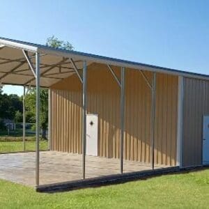 Metal storage building with open shelter.